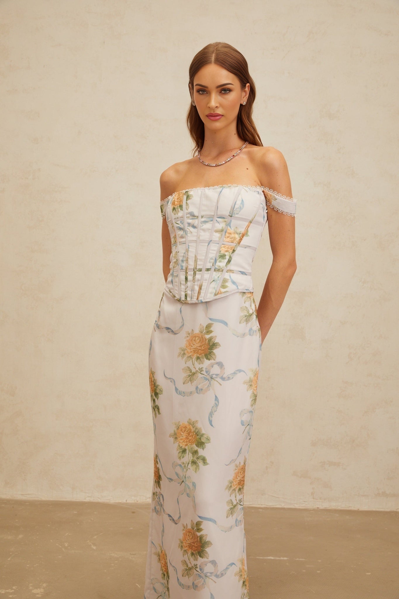 Blue floral print off the shoulder maxi dress with lace trim and decorative buttons