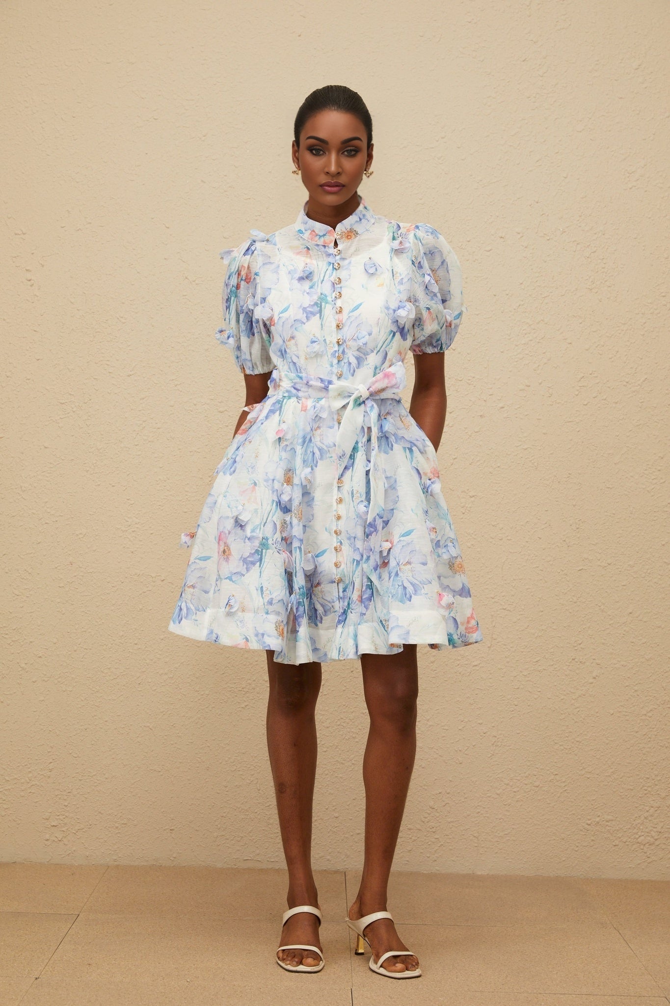 Blue floral print puff sleeve mini dress with decorative buttons and shirred effect