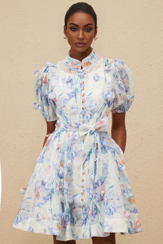 Blue floral print puff sleeve mini dress with decorative buttons and shirred effect