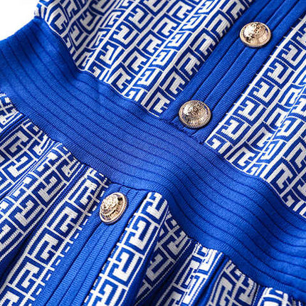 Blue geometric print A-line dress with gold buttons