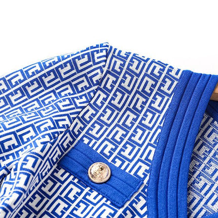 Blue geometric print A-line dress with gold-tone buttons and V-neckline