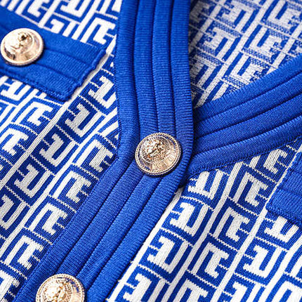 Blue geometric print A-line dress with gold-tone buttons and pockets