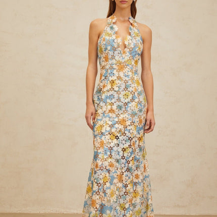 Blue halterneck sleeveless maxi dress with floral embroidery and cut-out design
