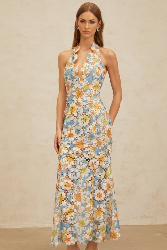 Blue halterneck sleeveless maxi dress with floral embroidery and cut-out design
