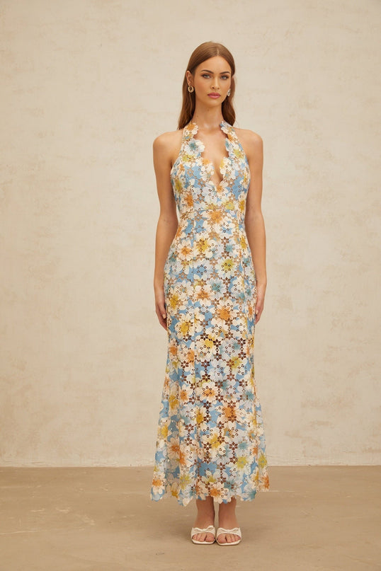 Blue halterneck sleeveless maxi dress with floral embroidery and cut-out design