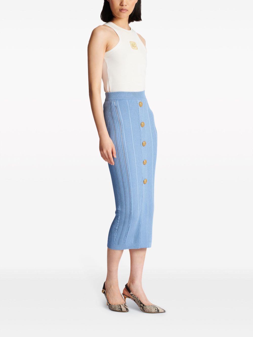 Blue high-waisted ribbed midi skirt with statement gold buttons