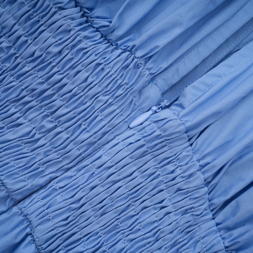 Blue maxi dress with floral petal detail and drawstring named Emma