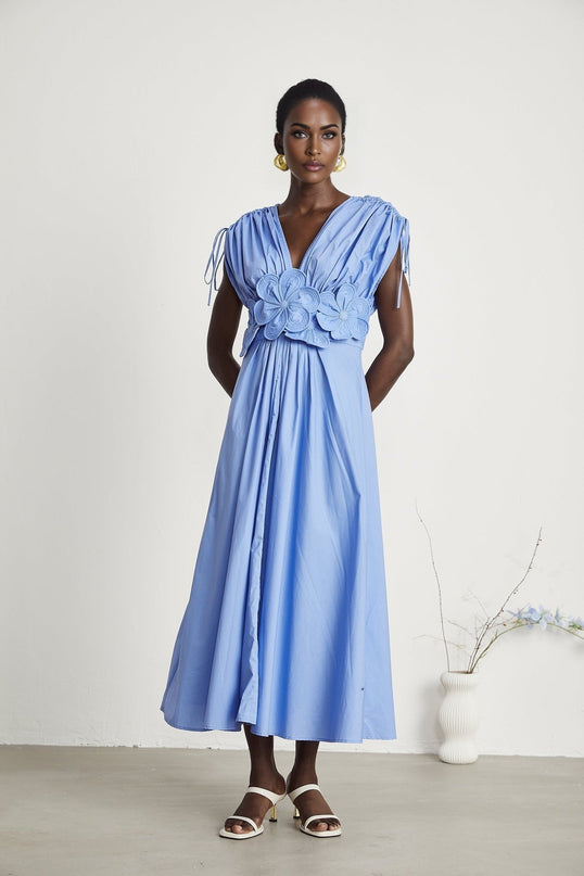 Blue maxi dress with petal detail and drawstring named Emma