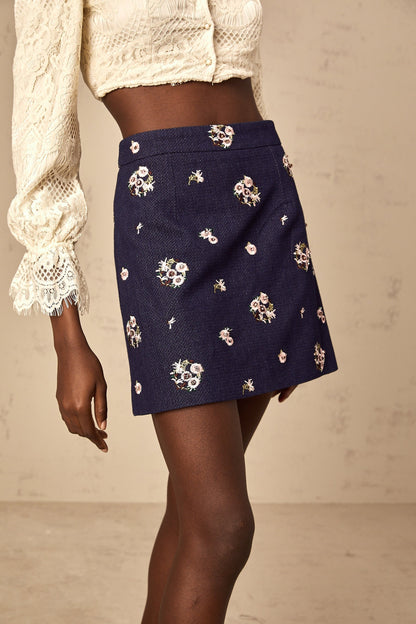 Blue mini skirt with floral embroidery details