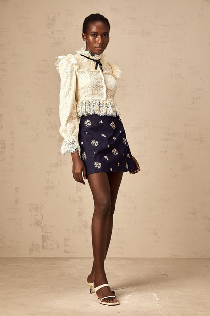 Blue mini skirt with floral embroidery details