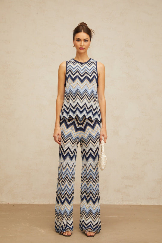 Blue and multicolor sleeveless top and trousers set with metallic threading and scallop hem