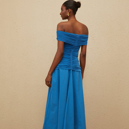 Blue off the shoulder maxi dress with cinched waist and ruched detailing