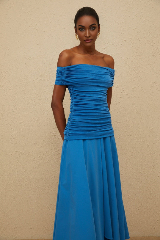Blue off the shoulder maxi dress with cinched waist and ruched detailing