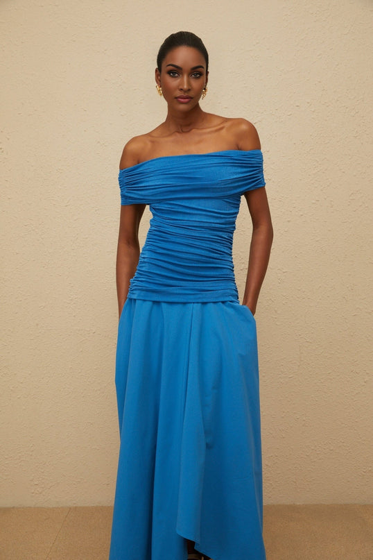Blue off the shoulder maxi dress with cinched waist and ruched detailing