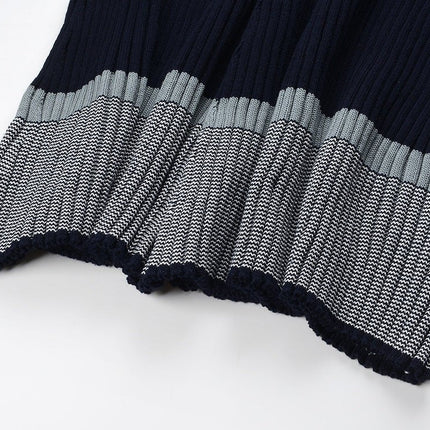 Blue ribbed knit dress with striped sleeves and skirt sections