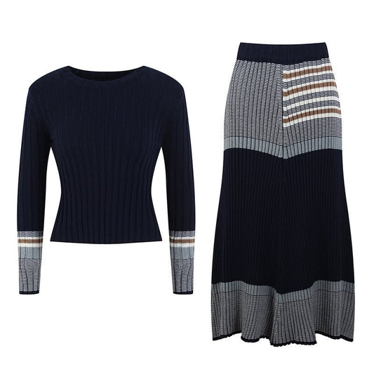 Blue ribbed knit dress with striped sleeves and skirt sections