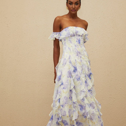 Blue sleeveless off the shoulder maxi dress with floral print and ruffled detailing