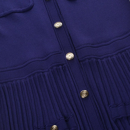 Blue tie-dye fitted knit top with pleats and pockets