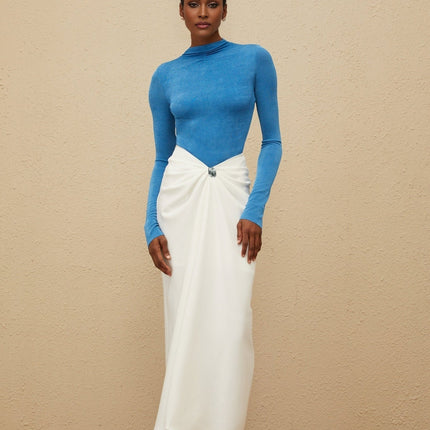 Blue turtleneck bodysuit with long sleeves and fitted silhouette