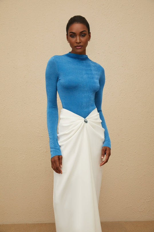 Blue turtleneck bodysuit with long sleeves and rear zip fastening