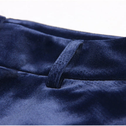Blue velvet double-breasted power suit with gold-tone buttons