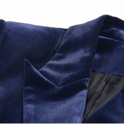 Blue velvet tailored power suit with gold-tone buttons