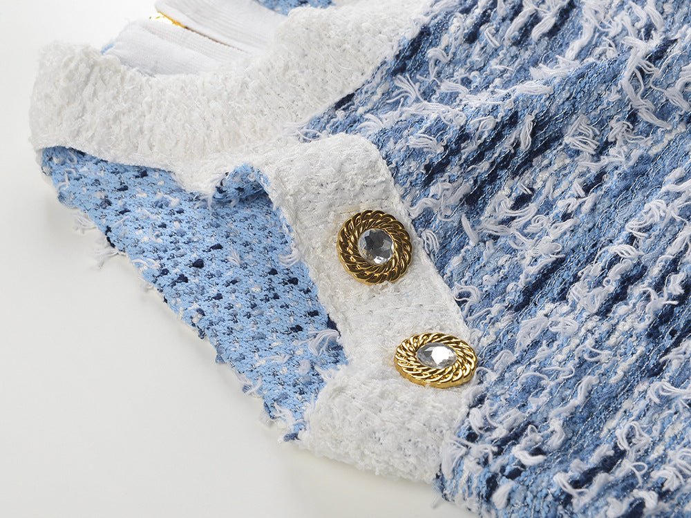 Sleek blue and white textured mini dress with fringe hem and gold buttons