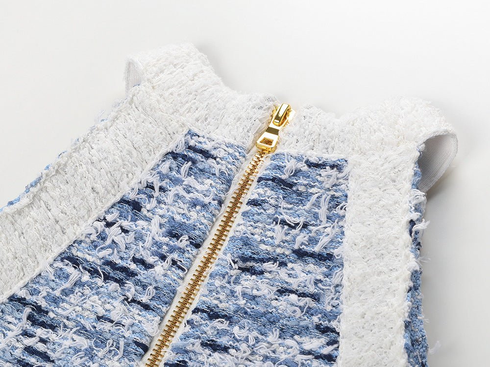 Sleek blue and white textured sleeveless mini dress with fringe hem and gold buttons