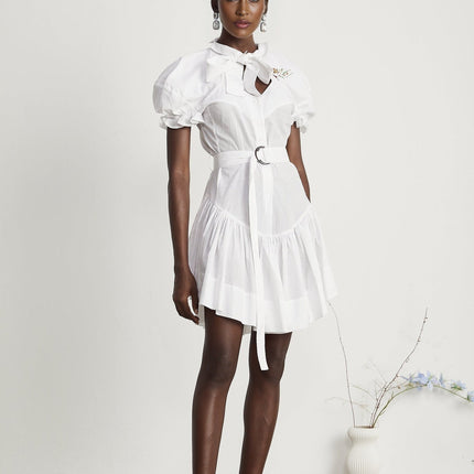 Brinley White Poplin Mini Dress Sweetheart Neck Floral Embroidery Short Puff Sleeves Elasticated Cuffs Pussy-Bow Fastening Asymmetric Hem Pleat Detailing Detachable Adjustable Waist Belt Front Button Placket 100% Cotton Thigh-Length Elegant Comfortable