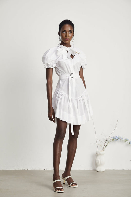 Brinley White Poplin Mini Dress Sweetheart Neck Floral Embroidery Short Puff Sleeves Elasticated Cuffs Pussy-Bow Fastening Asymmetric Hem Pleat Detailing Detachable Adjustable Waist Belt Front Button Placket 100% Cotton Thigh-Length Elegant Comfortable