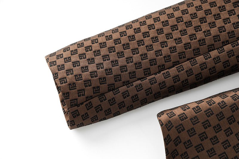 Brown double-breasted tailored blazer with geometric pattern and gold buttons