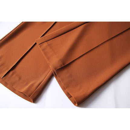 Brown high-waisted flared-leg pants with gold-tone chain embellishment