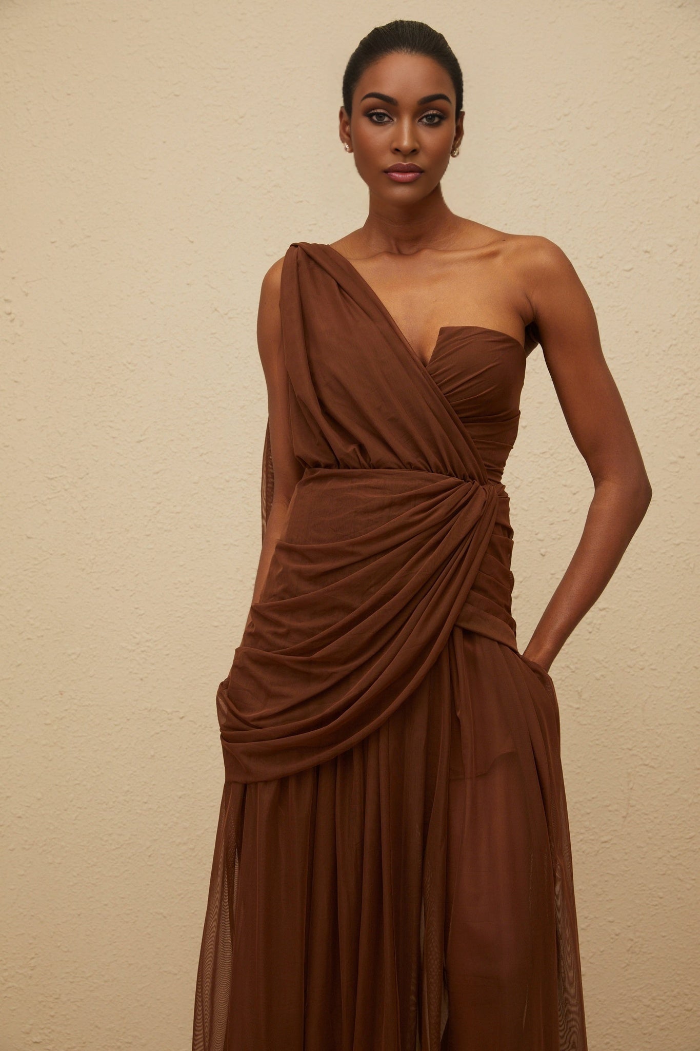 Brown one shoulder sleeveless maxi dress with ruched detailing and tulle