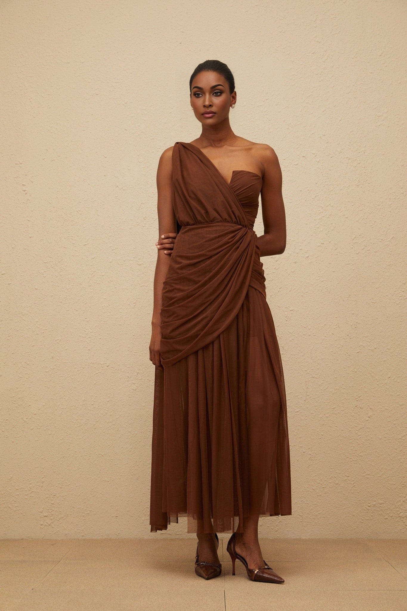 Brown one shoulder sleeveless maxi dress with ruched detailing and tulle