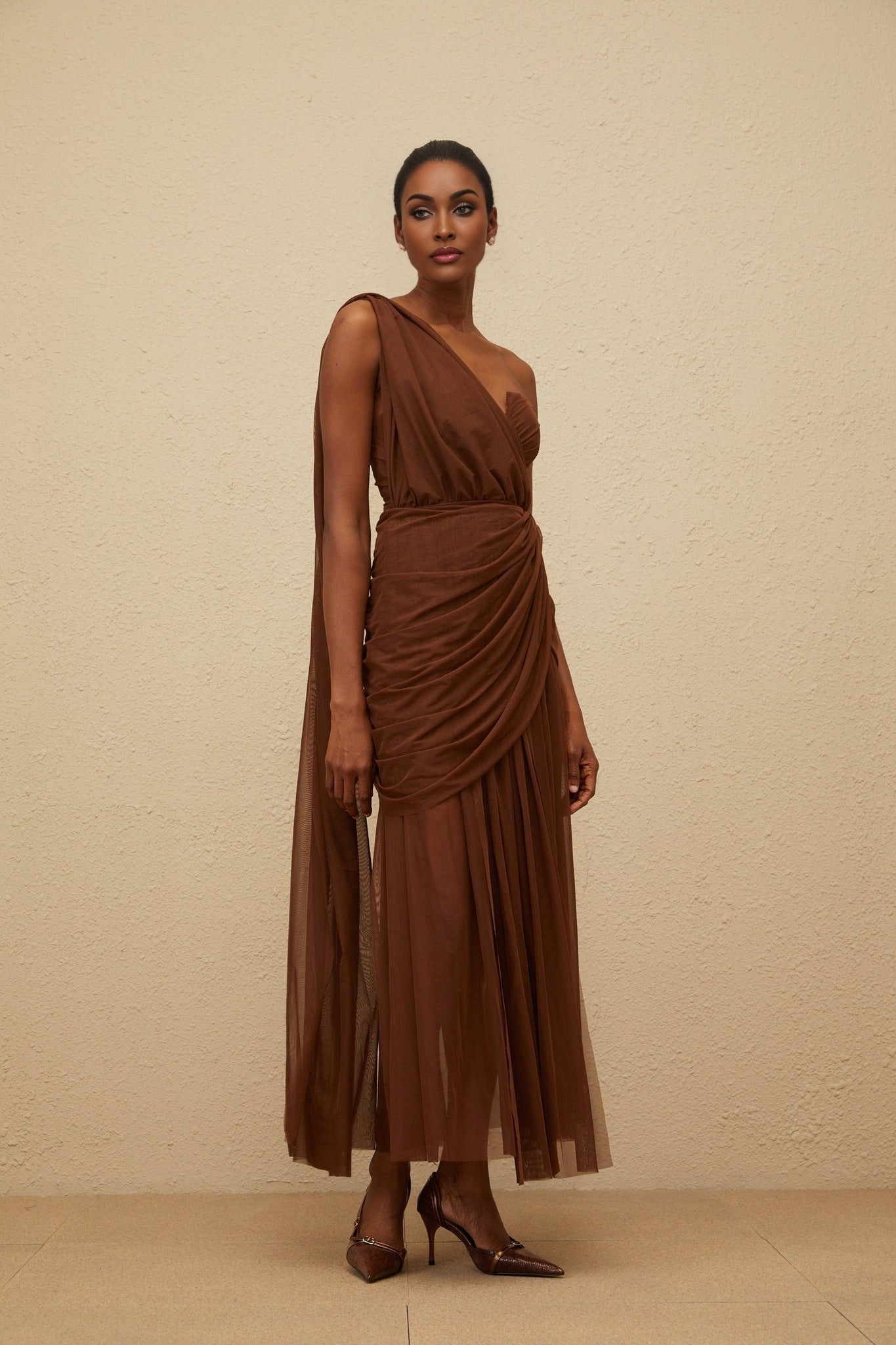 Brown one shoulder tulle maxi dress with ruched detailing and cinched waist