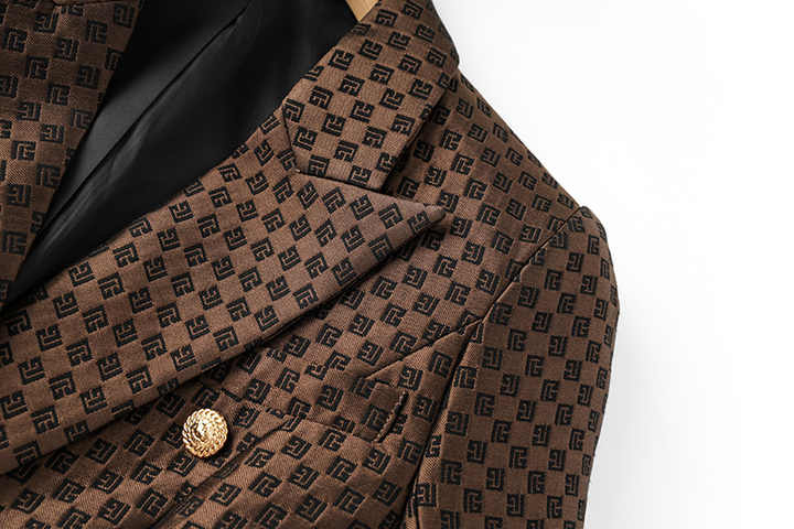 Brown tailored double-breasted blazer with geometric pattern and gold buttons