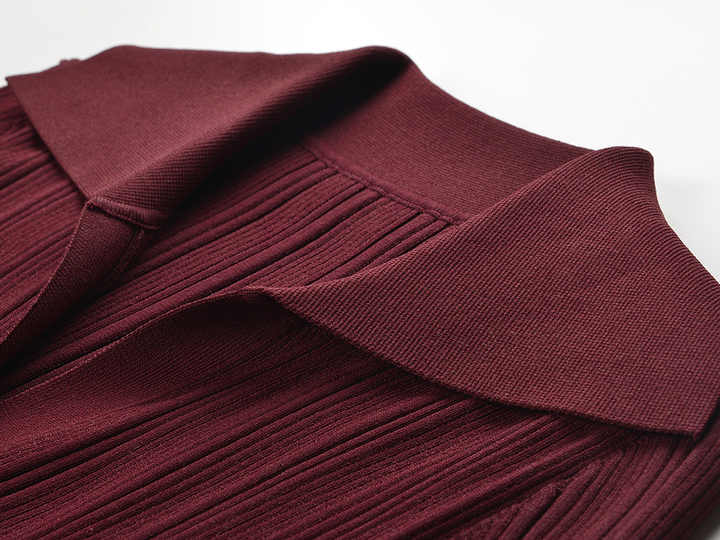 Burgundy ribbed knit sweater with button details