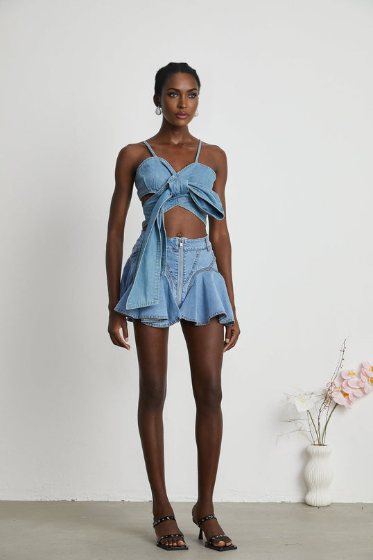 Capucine Blue Denim Pleated Mini Skirt with Ruffle Hemline and Front Zipper Closure