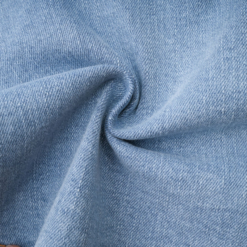 Capucine Pleated Mini Skirt Blue Denim Flared Ruffle Hemline Zipper Closure Pockets