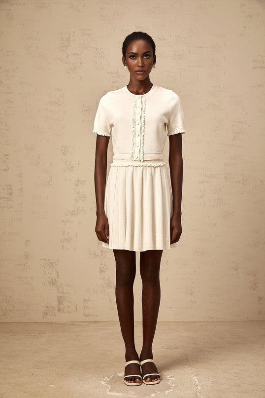 Carly White Knit Top and Skirt Set with Ruffled Trim and Pleated Detailing