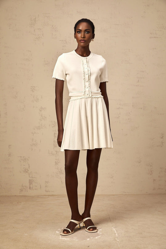 Carly White Knitted Top and Skirt Set with Ruffled Trim and Pleated Detailing