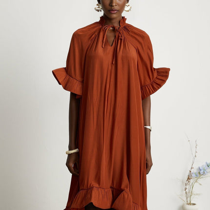 Carmelina Brown Midi Dress in Luxurious Terylene with Frilled Self-Tie Neck and Asymmetric Hem