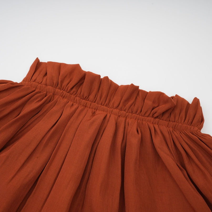 Carmelina Brown Midi Dress in Luxurious Terylene with Frilled Self-Tie Neck and Asymmetric Hem