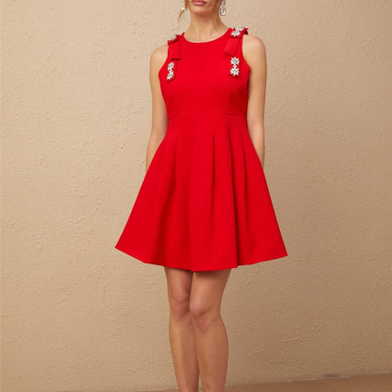 Caroline Red Textured Mini Dress Crystal Embellishment Bow Detailing Pleated Skirt Sleeveless Round Neck Thigh Length Rear Zip Fastening