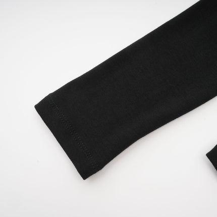 Cassidy Black Cut Out Top with Gold Hardware and Rear Zip Fastening