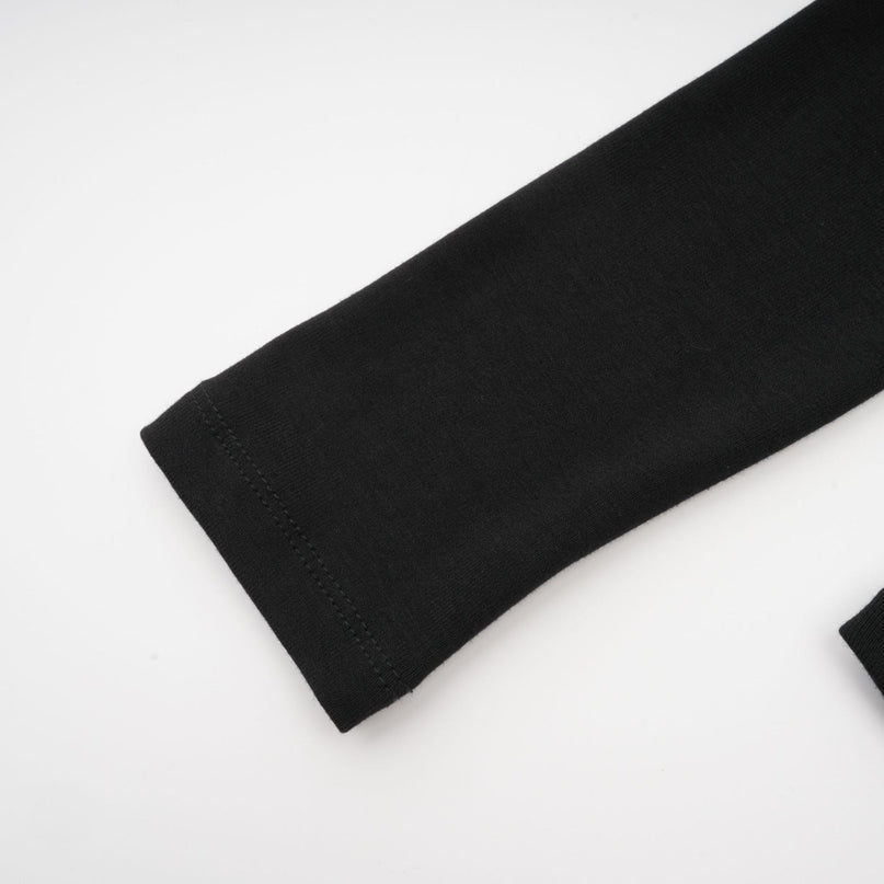 Cassidy Black Cut Out Top with Gold Hardware and Rear Zip Fastening