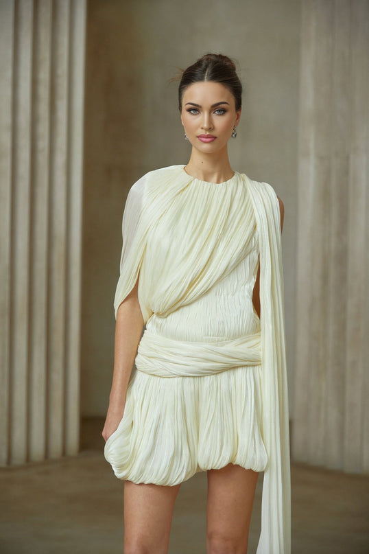 Cassidy Neutrals Pleated Mini Dress with Glitter-Accented Bubble Hem and Asymmetrical Twist Detailing