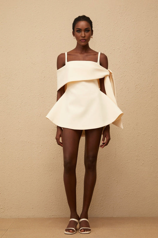 Caterina Mini Dress in Cream White Neutrals Terylene fiber square neck sleeveless wide straps fitted waistline self-tie detail flared skirt rear zip fastening thigh-length timeless piece style comfort refined grace