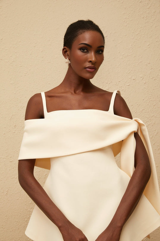 Caterina Mini Dress in Cream White Neutrals Terylene Fiber Square Neck Sleeveless Wide Straps Fitted Waistline Self-Tie Detail Flared Skirt Rear Zip Fastening Thigh-Length Elegant Chic Sophisticated Comfortable