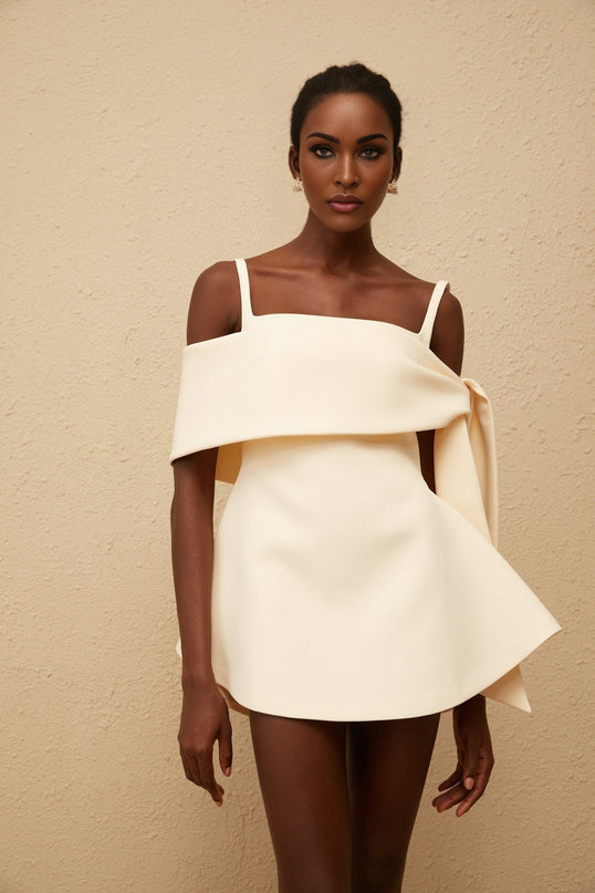 Caterina Mini Dress in Cream White Neutrals Terylene Square Neck Sleeveless Wide Straps Fitted Waistline Self-Tie Detail Flared Skirt Rear Zip Fastening Thigh-Length Timeless Piece Style Comfort Refined Grace